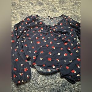 Size small Hollister top. Navy with red flowers.